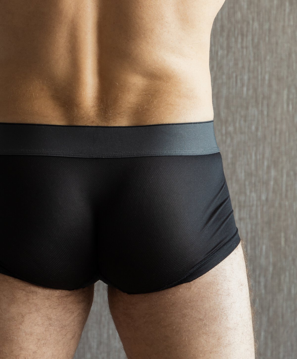 Chicago buttocks reshaping for men model with black shorts